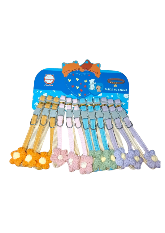 Cute adjustable cat collar with plush flower charm and safety breakaway buckle in pastel colors for kittens and adult cats.